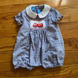 Plaid jumper with fire truck